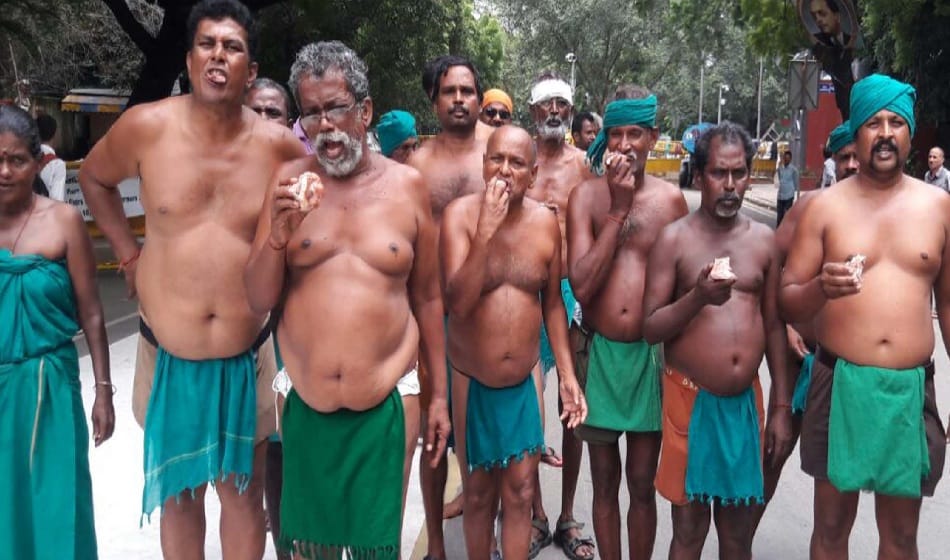 Tamil Nadu farmers protest by eating beef at jantar mantar on tuesday over drought relief funds  