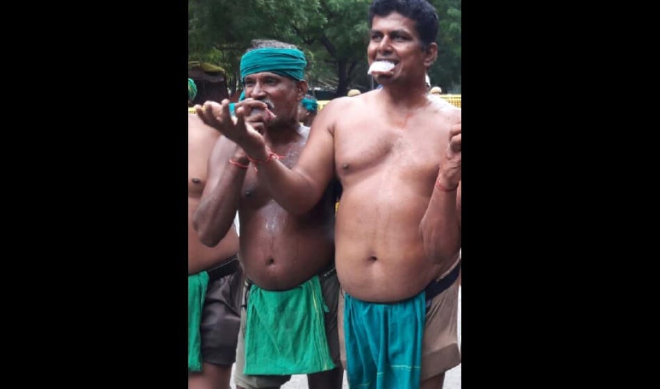 Tamil Nadu farmers protest by eating beef at jantar mantar on tuesday over drought relief funds  