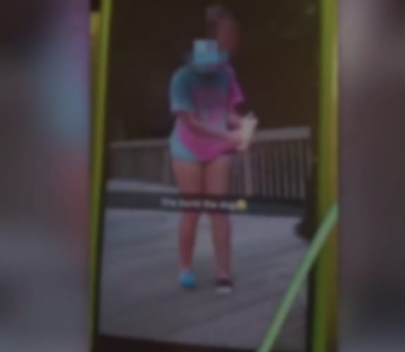 Video on social media shows North Carolina teen lighting flame at dog