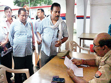 Report against the pradhan, husband on indecency
