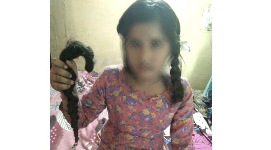 School Girl Hair cut down at Hamirpur.