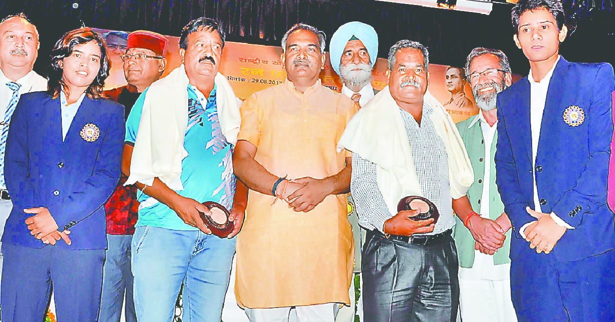 uttarakhand government honored players on national sports day