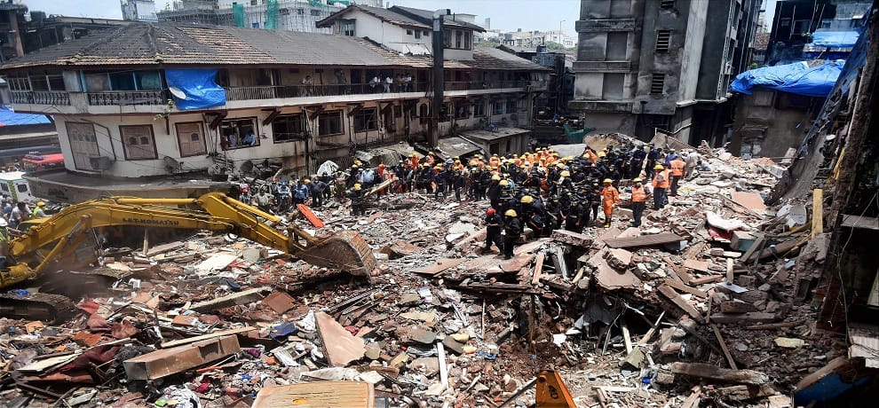 after heavy rain in mumbai three stories building collapsed in jj marg