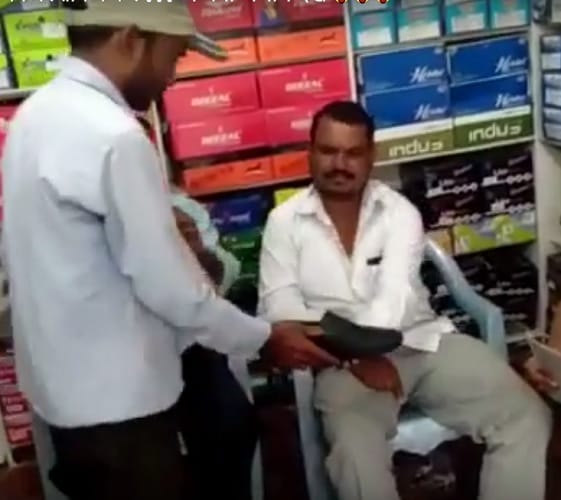 watch this viral video of Irritated shopkeeper slaping customer 