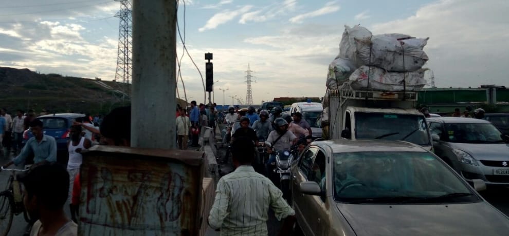 traffic jam on ghazipur murga mandi road where a garbage dump caved in