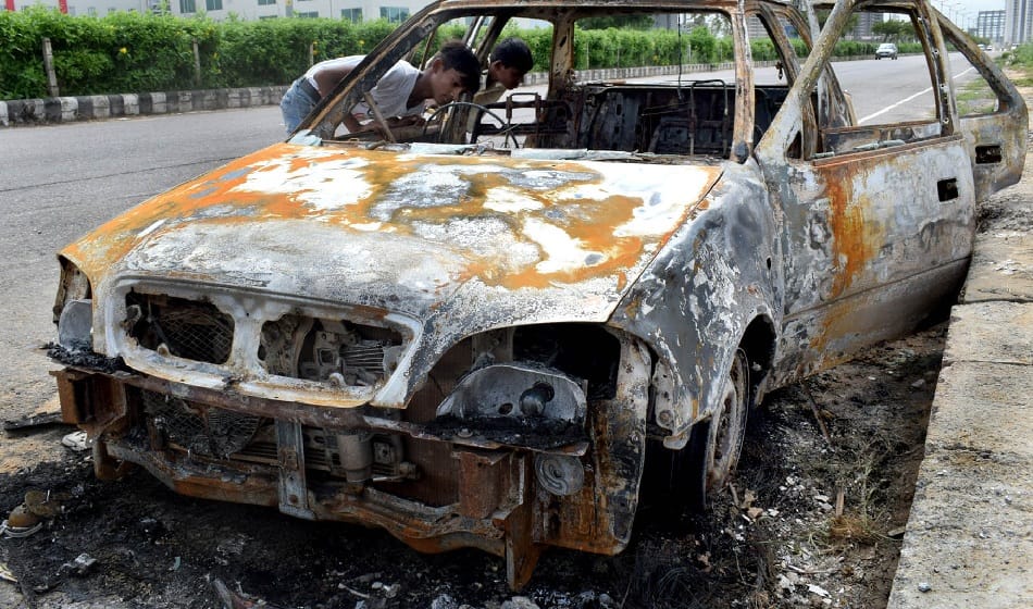 three persons burned alive as car catches fire in gurugram