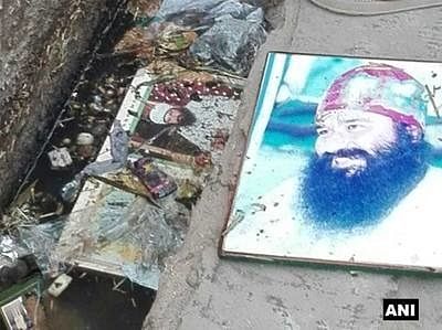 many photos and posters of gurmeet ram rahim found in drain in sriganganagar rajasthan