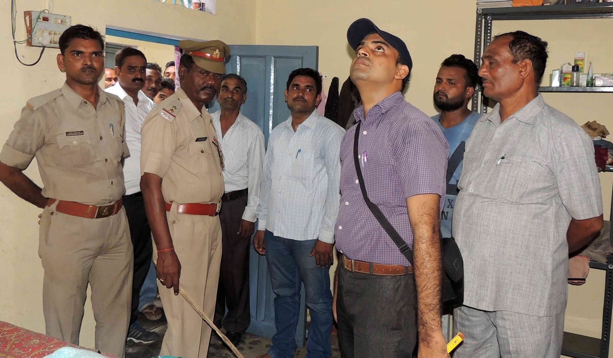Teacher's body found hanging from a trap