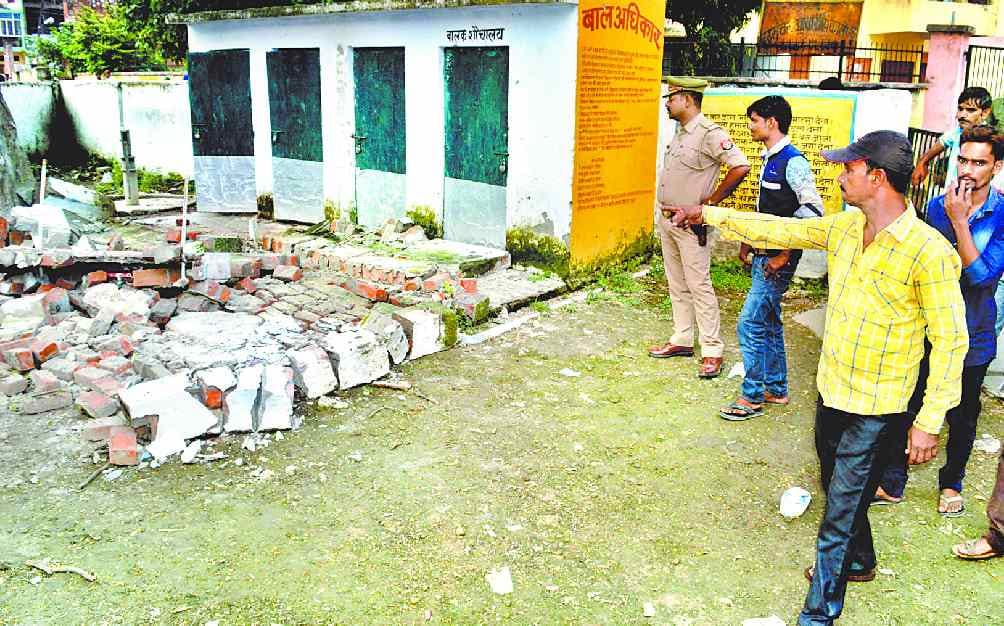 School wall collapse death of a child