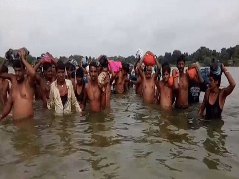 dead bodies to reach crematorium have to cross the river