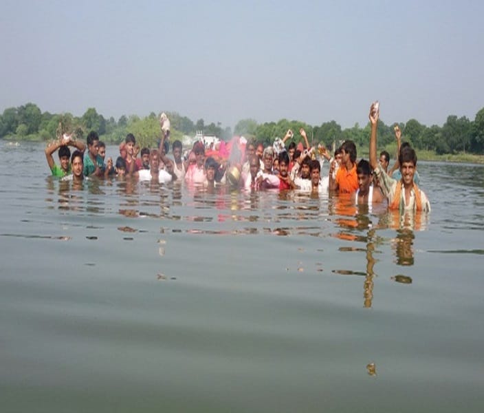 dead bodies to reach crematorium have to cross the river