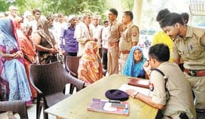 ladies stage protest infront of police station