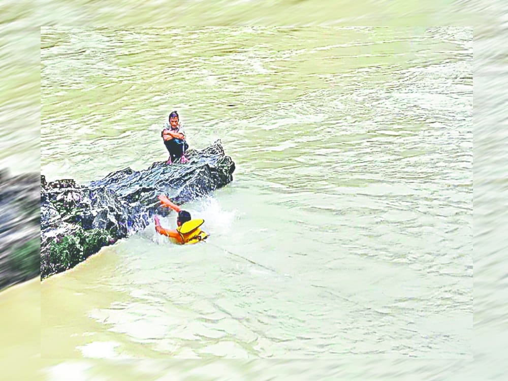 Nepali  boy rescue from bhagirathi river