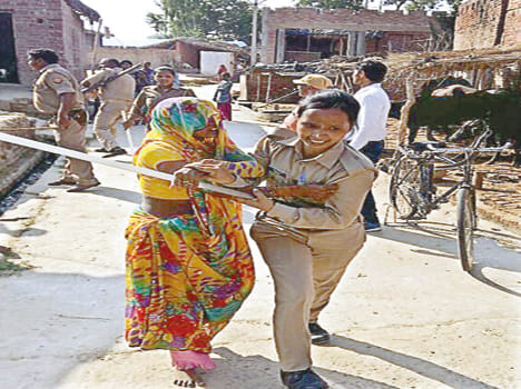 pradhan gives patta, womens protest