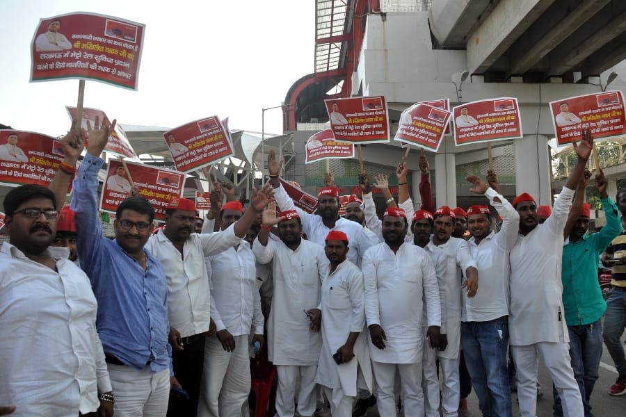SP activists celebrate on metro stations in Lucknow.