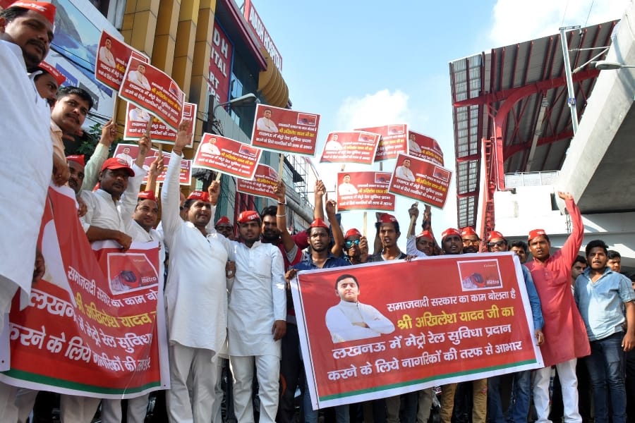 SP activists celebrate on metro stations in Lucknow.