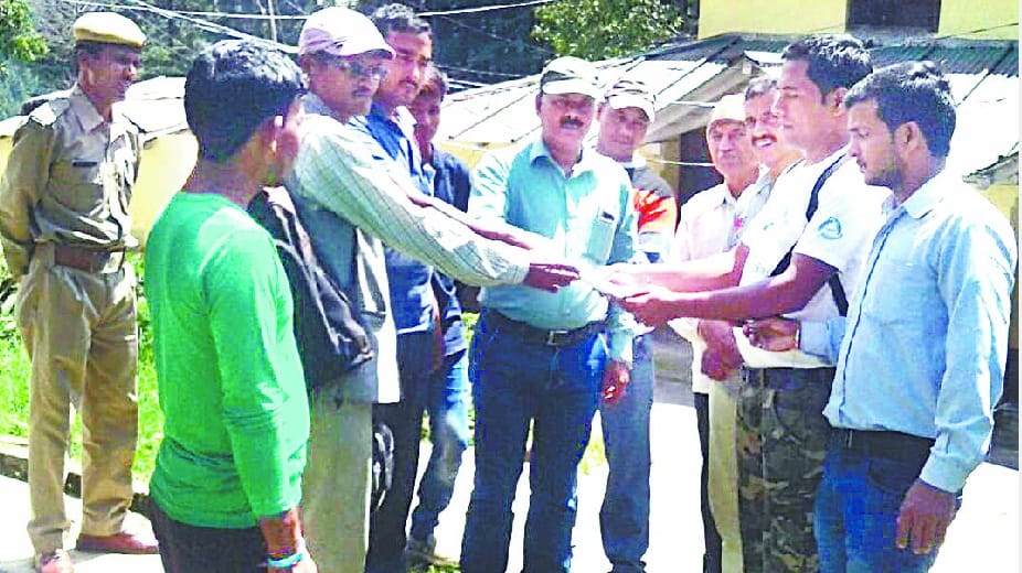 Assess the land and the trees before the villagers