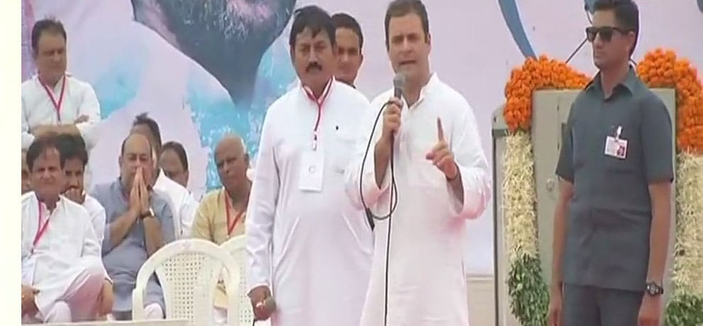 Rahul gandhi targets to modi government on GST in gujarat Ahmedabad