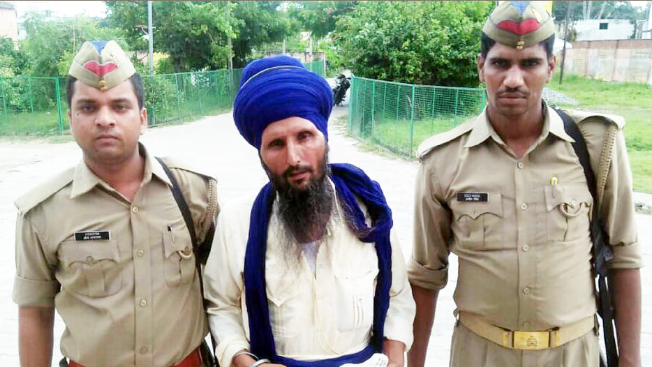 arrested for sheltering terrorists