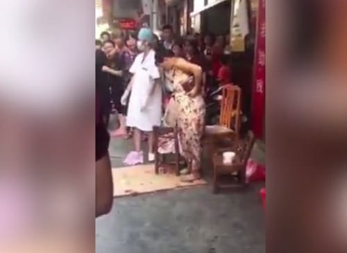 Women gave birth to child while shopping in market at Yunfu in southern China