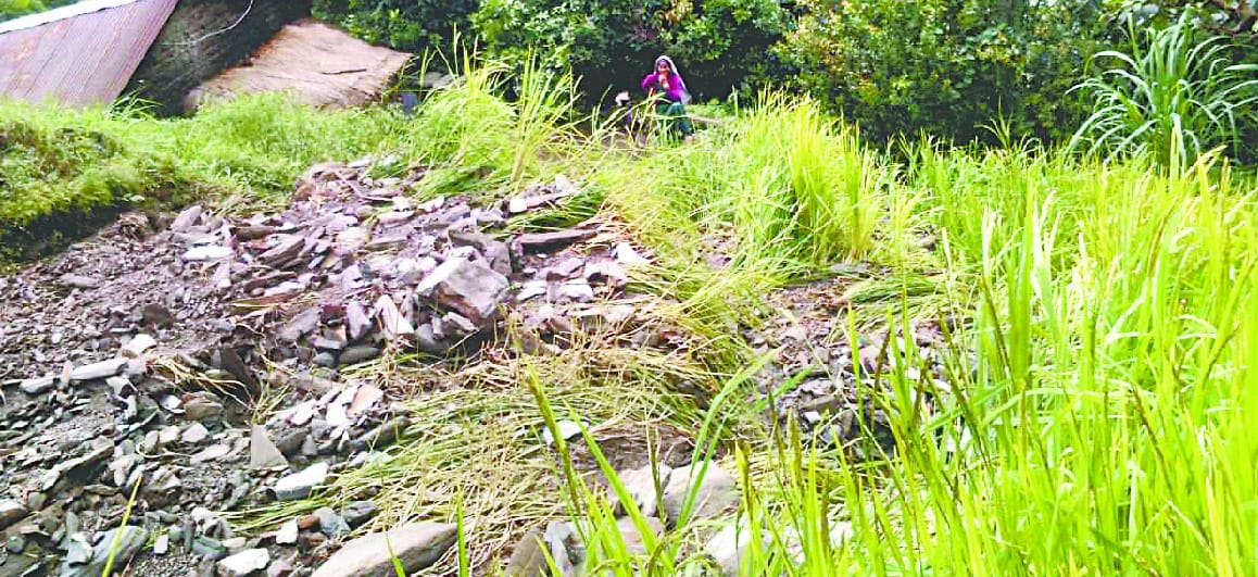 Threat to Bashani village by the debris of Manidhi road