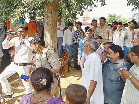 Students from the grounds of college land grabbing
