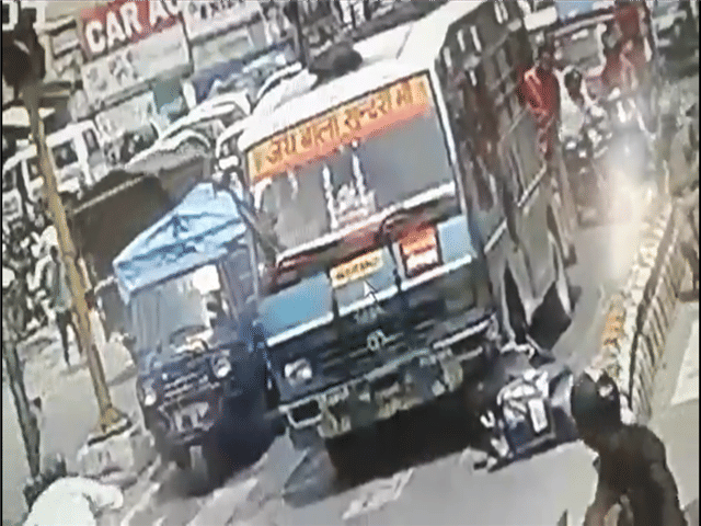 Miracle save youth who fell under running bus in dehradun
