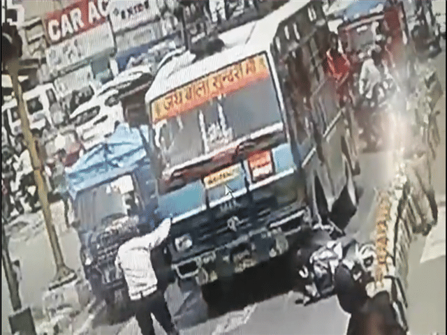 Miracle save youth who fell under running bus in dehradun