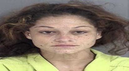 a woman slips off handcuffs and steals police car, all incident catch in cctv camera