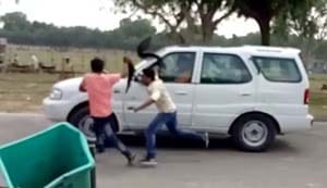 Sapachi, showing black flags, arrested, near the moving car of CM