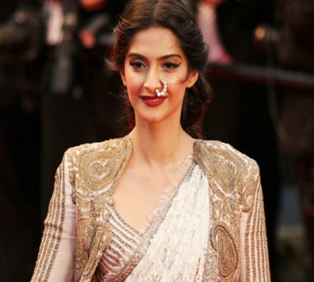 You can try Bollywood actresses traditional  jewellery look with western dress