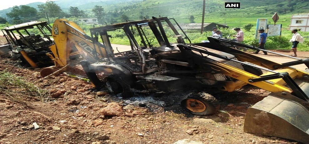 Andhra pradesh: naxals set fire to four JCBs In Visakhapatnam