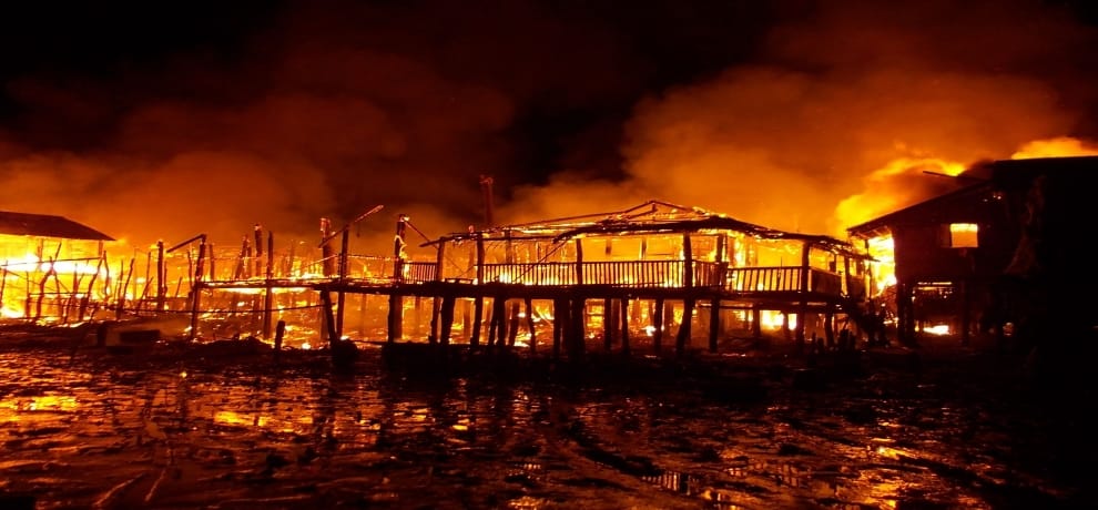 A village of Rohingya Muslims was burning