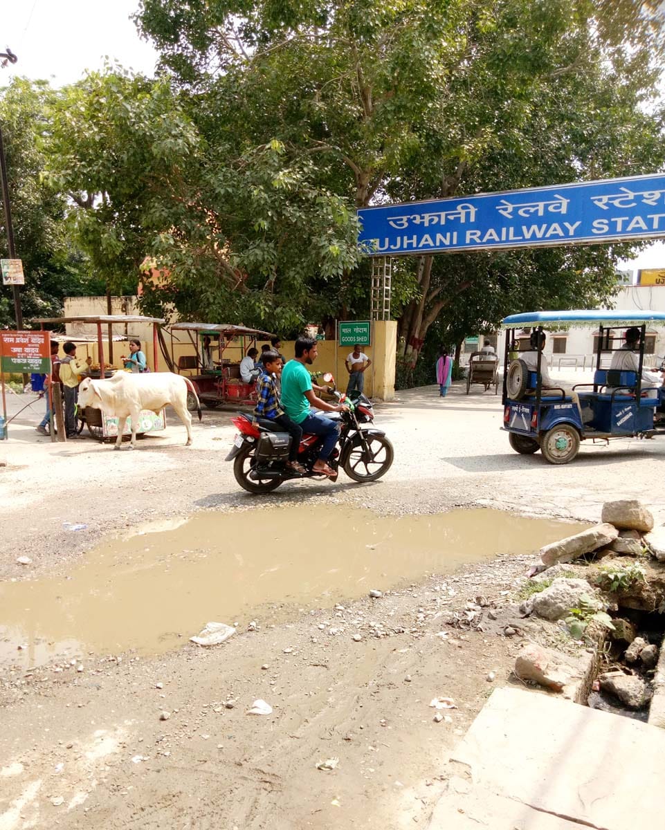 Loaded trucks affected by the spoiled railway road
