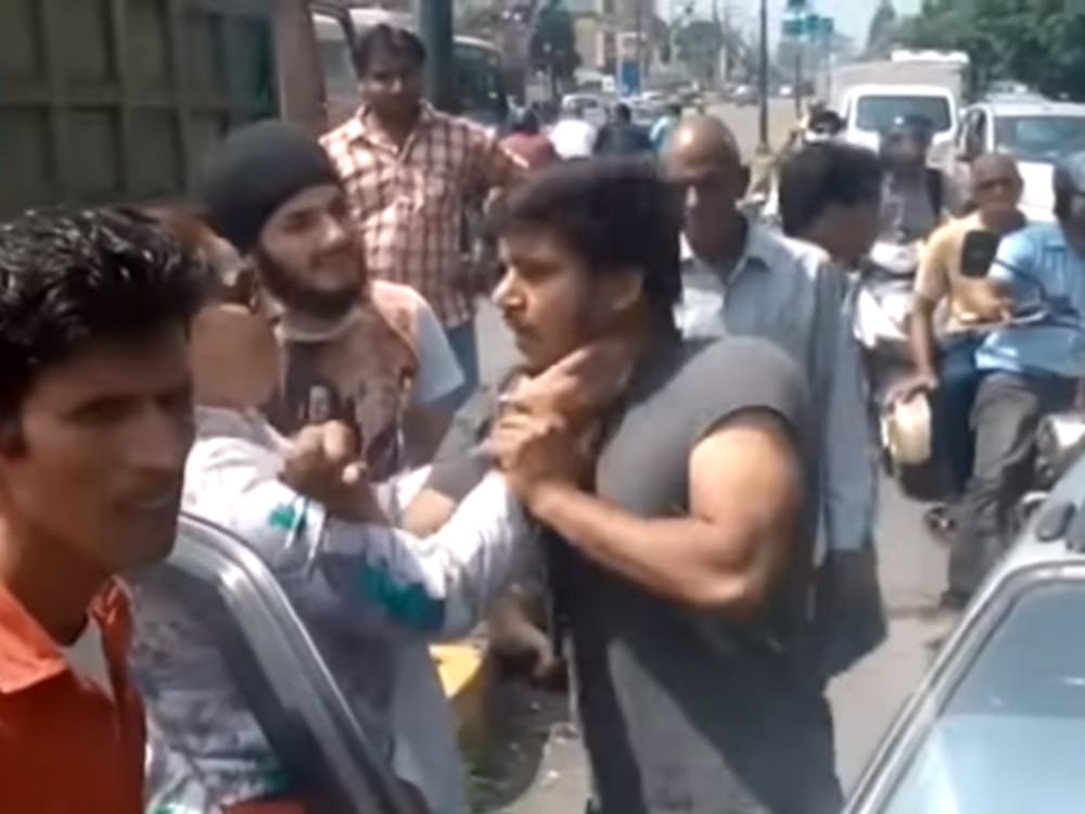 congress women leader beaten a boy on road in Dehradun