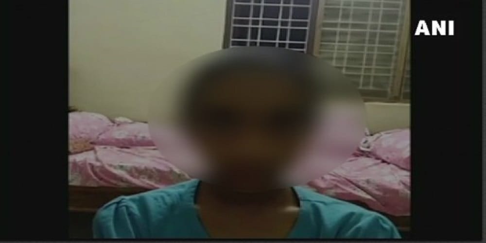 teacher punished girl to stand in boys toilet for not wearing school uniform