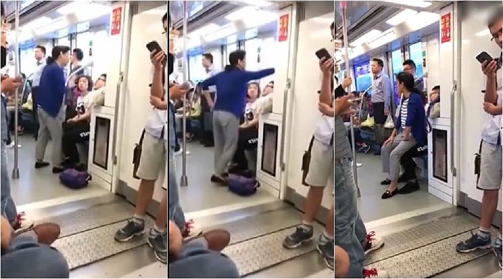  Woman sits on boy lap who refused to give seat in metro in Nanjing, China