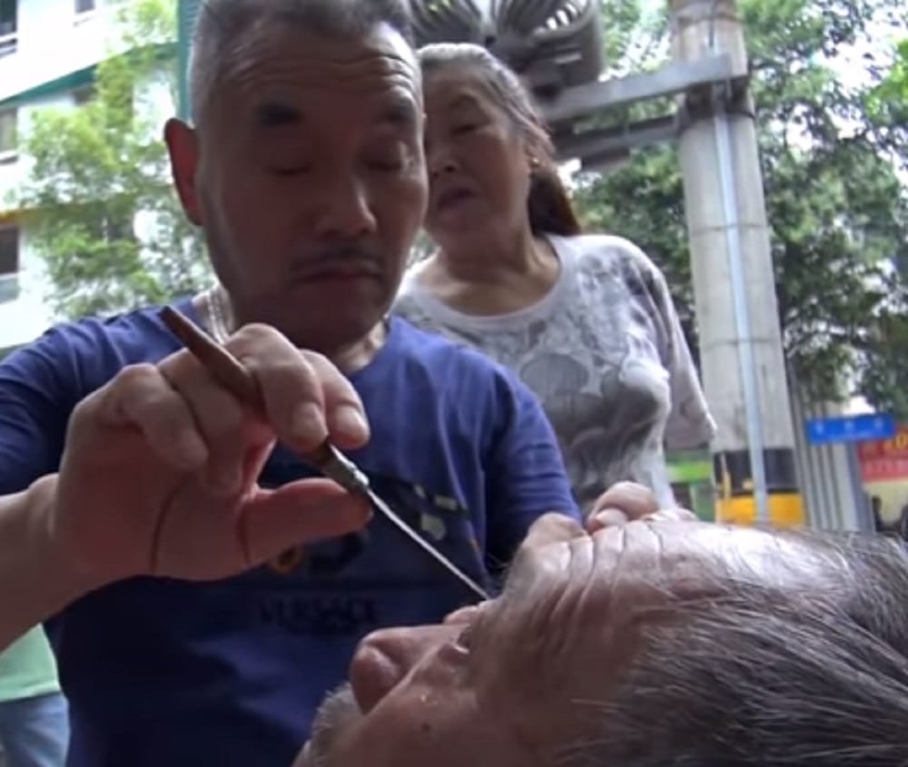 Watch how Man cleans eyes with Knife