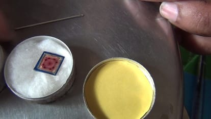 The world's smallest golden carrom, unique strickers