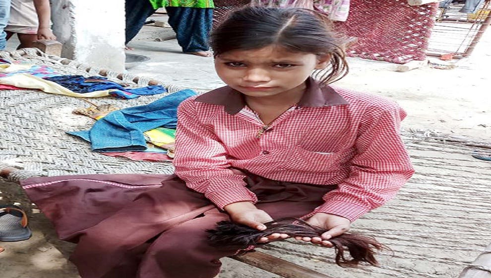 a woman Principal cut the Peak of school girl in aligarh