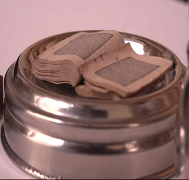 Is this the world's smallest quran, the Hindu family worship in the temple daily
