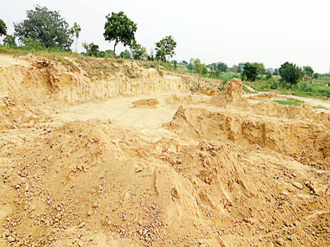 The home guard was thrown out of the tractor for refusing illegal mining.