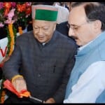 CM Virbhadra Singh flag off two new HPTDC volvo buses