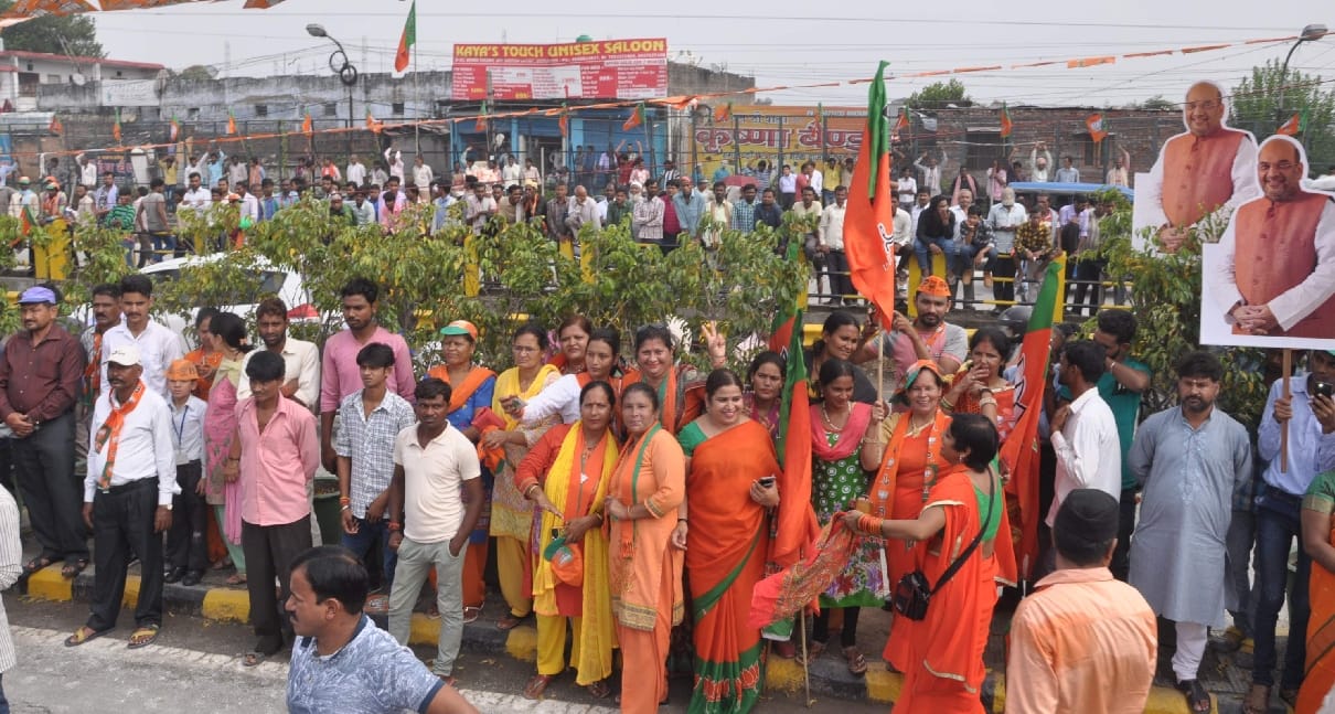 Amit shah welcome photos in dehradun