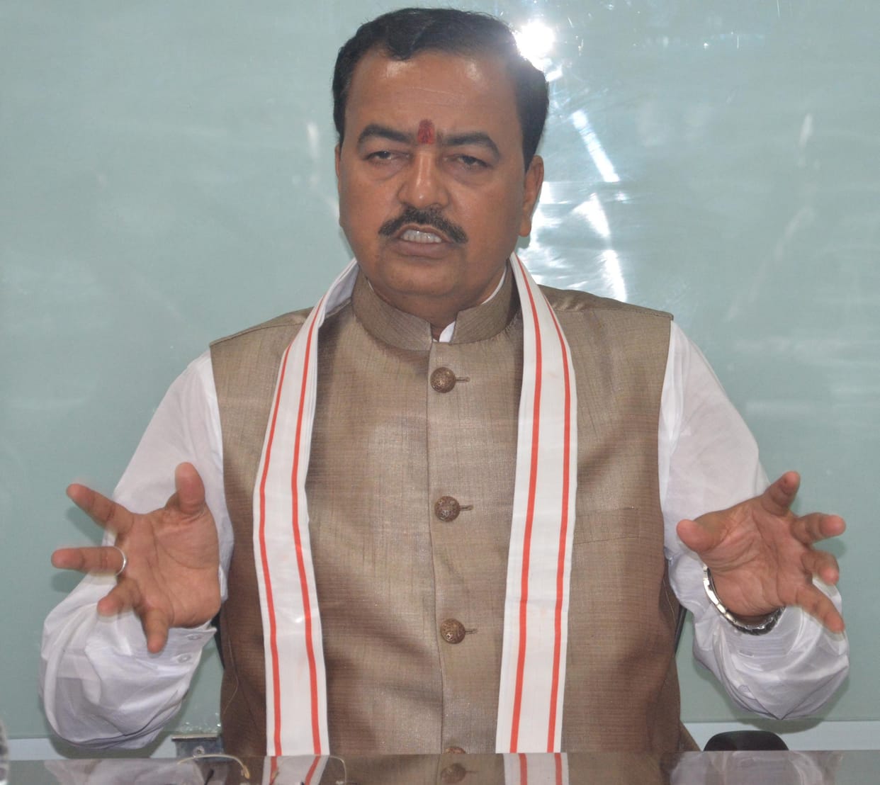 keshav prasad maurya suspended an engineer for carelessness in pathole free roads plan.