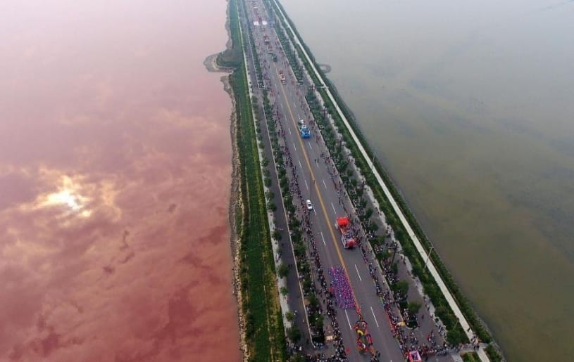 china dead sea turns pink and green, see pictures