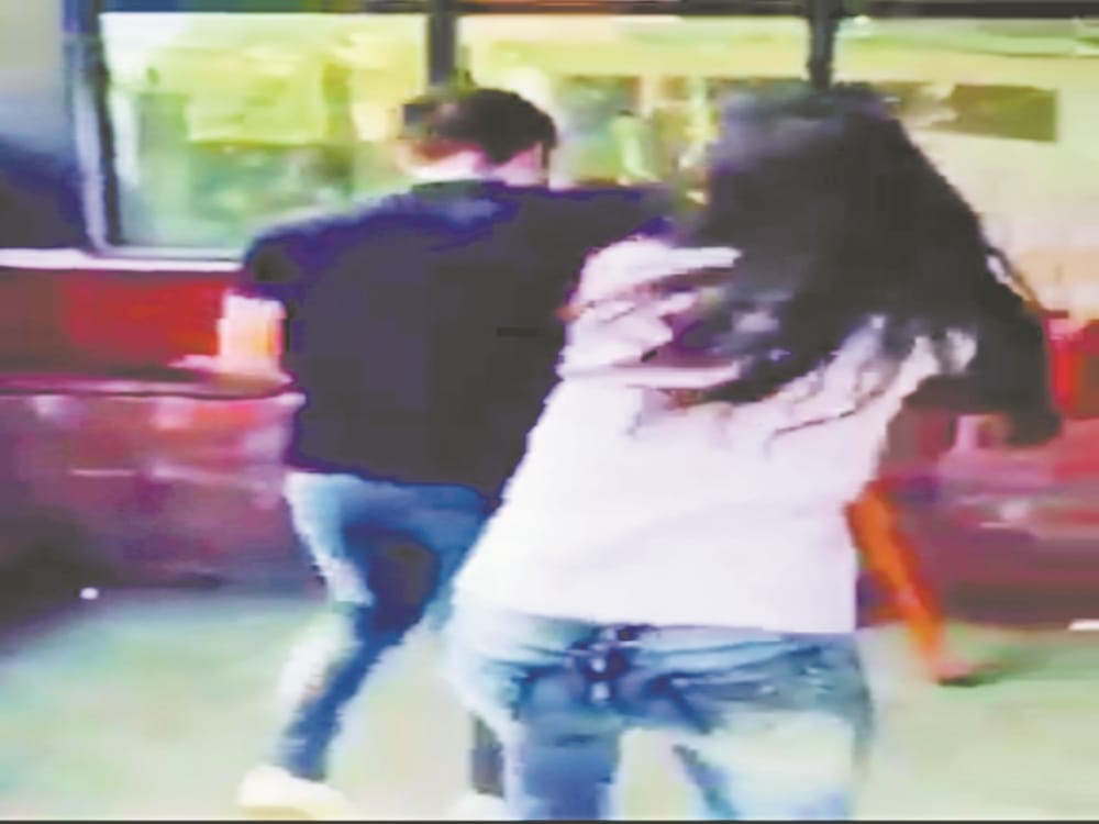 wife beaten by Husband's girlfriend 