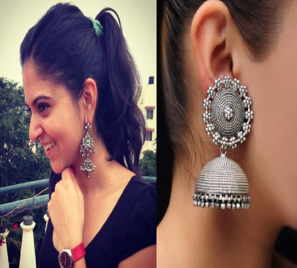 The trend of wearing ethnic earrings on western dress comes over again 