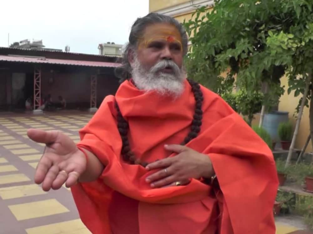 Akhara Parishad chief Narendra Giri angry on Pooja Bedi for her Statement to Compared Milind Soman Nude Race With Nagas