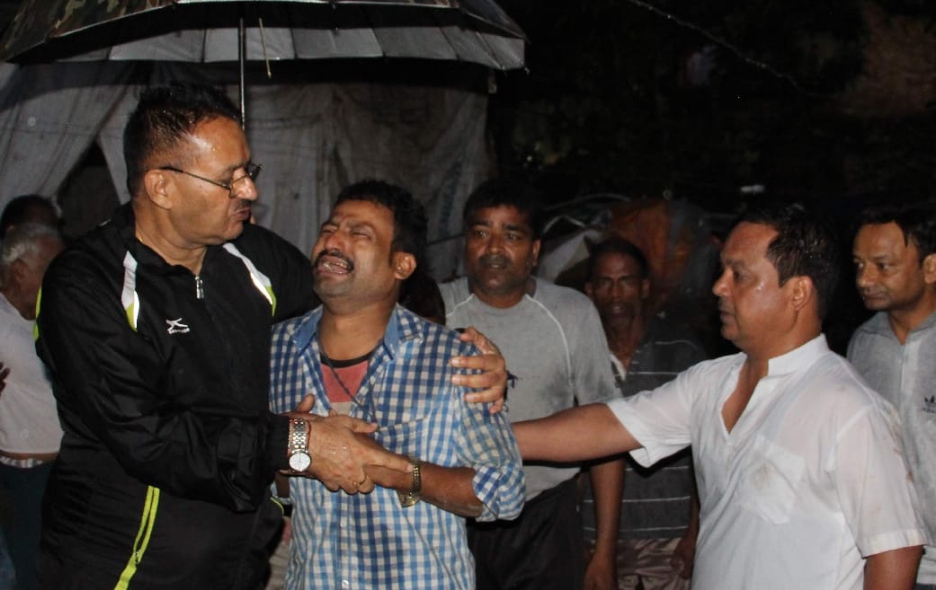 Father crying after see his sons situation during house collapse 